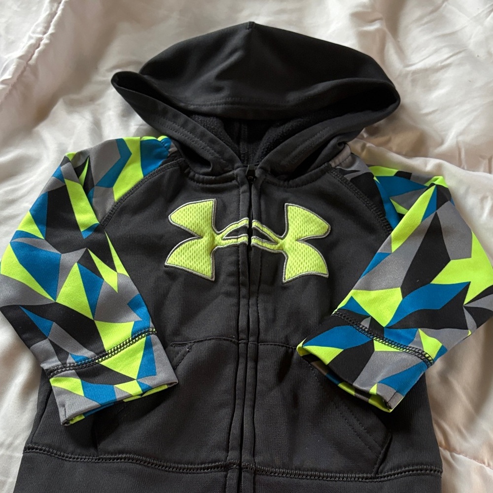 Under Armour Black Hoodie with Neon Yellow-Green Logo and Blue Geometric Sleeves